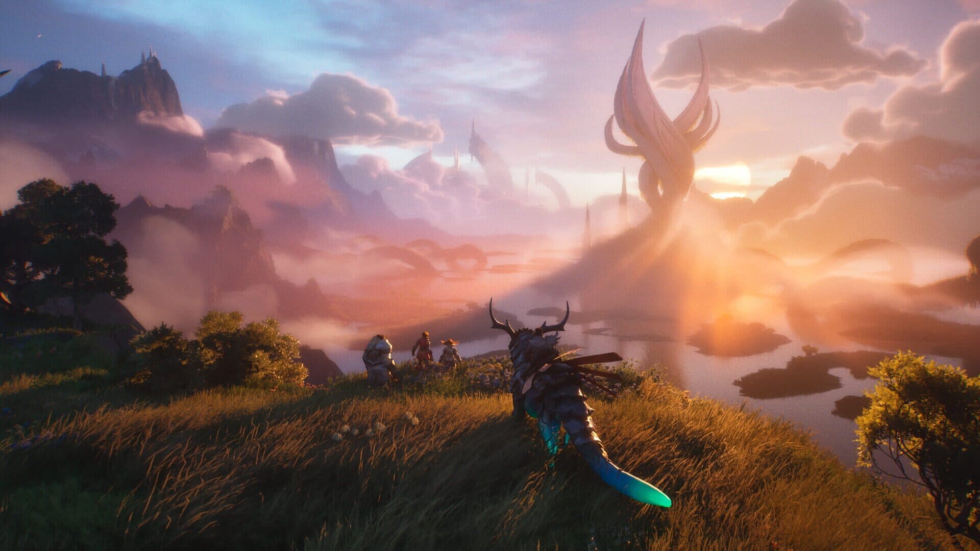 A valley at sunset beneath a towering rock spire